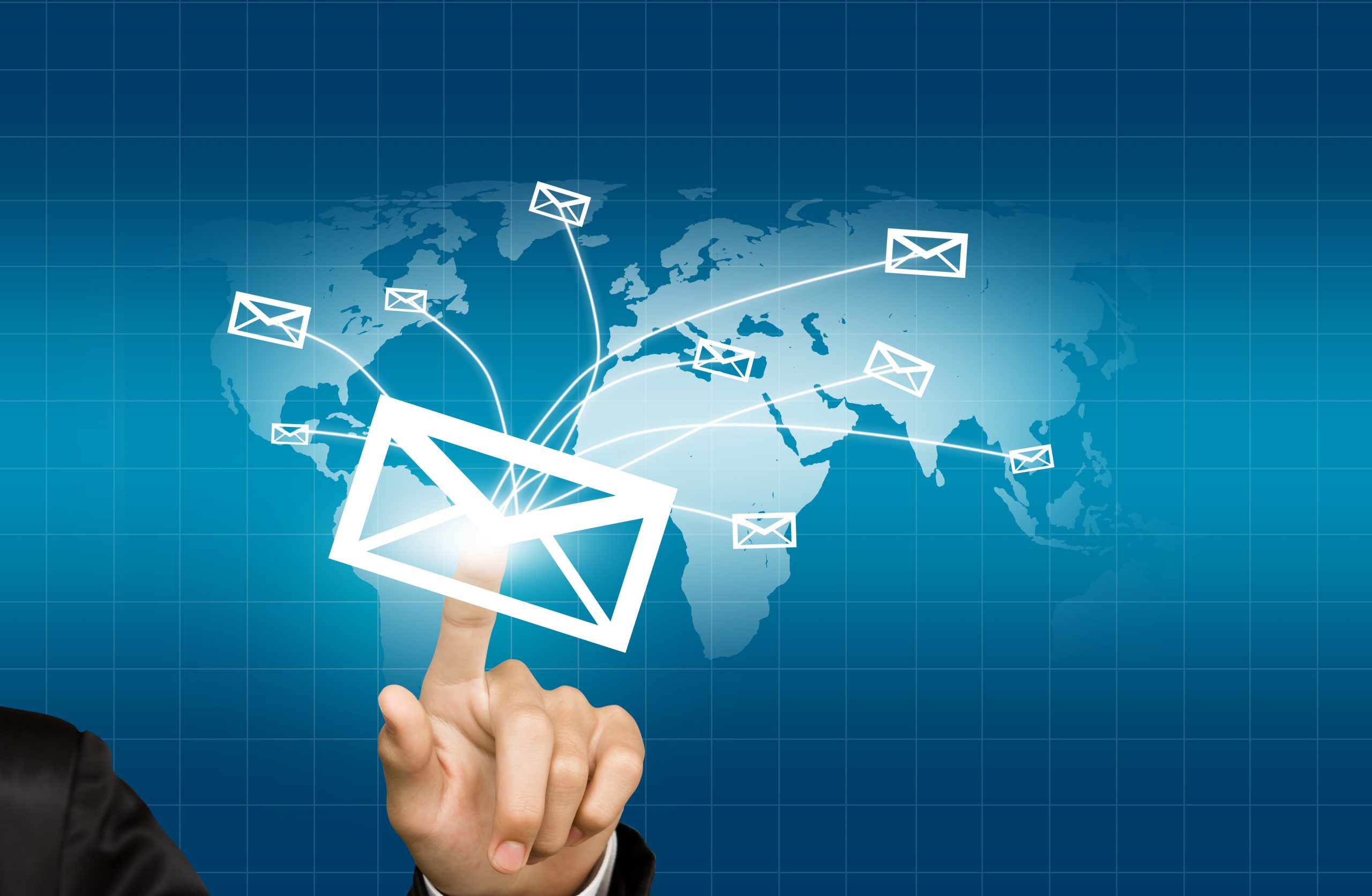 Hands with world mail delivery on world map background. Why email automation is important in Digital marketing for real estate companies